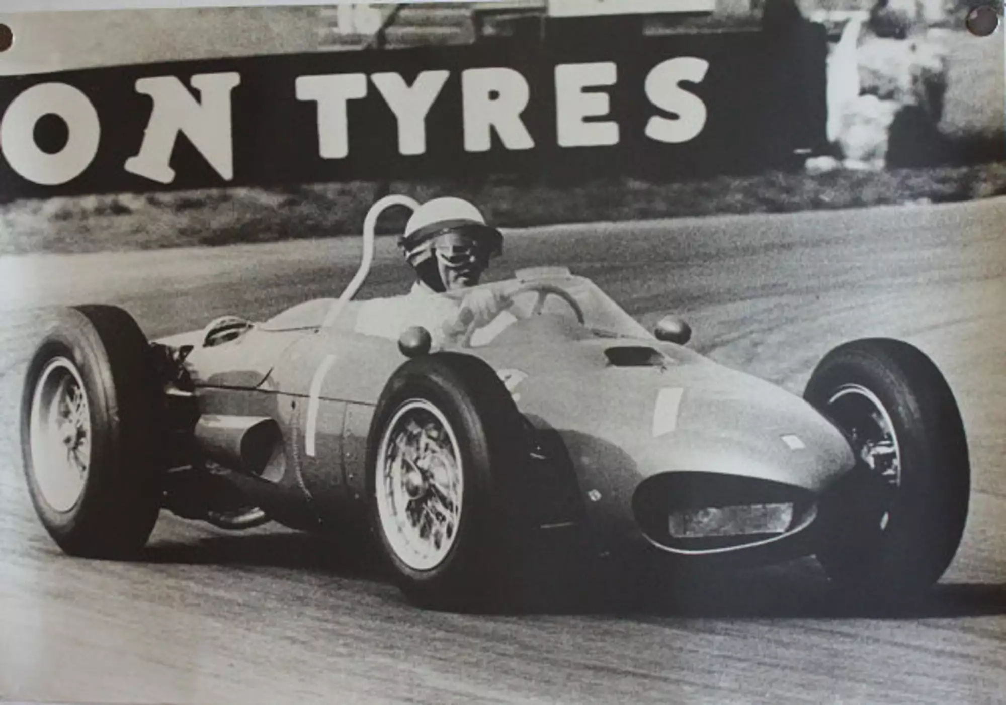 Seven Large Format Photographic Prints of Grand Prix Ferraris Through the Years