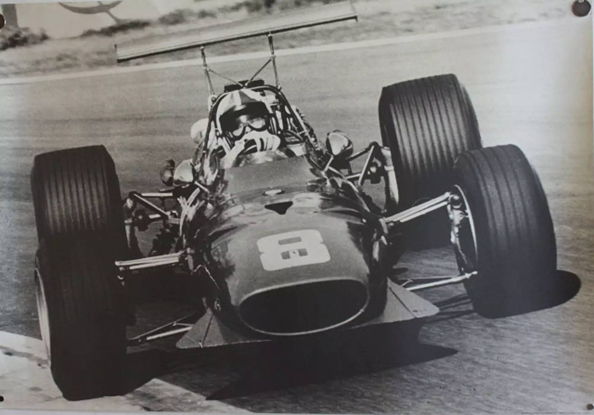 Seven Large Format Photographic Prints of Grand Prix Ferraris Through the Years
