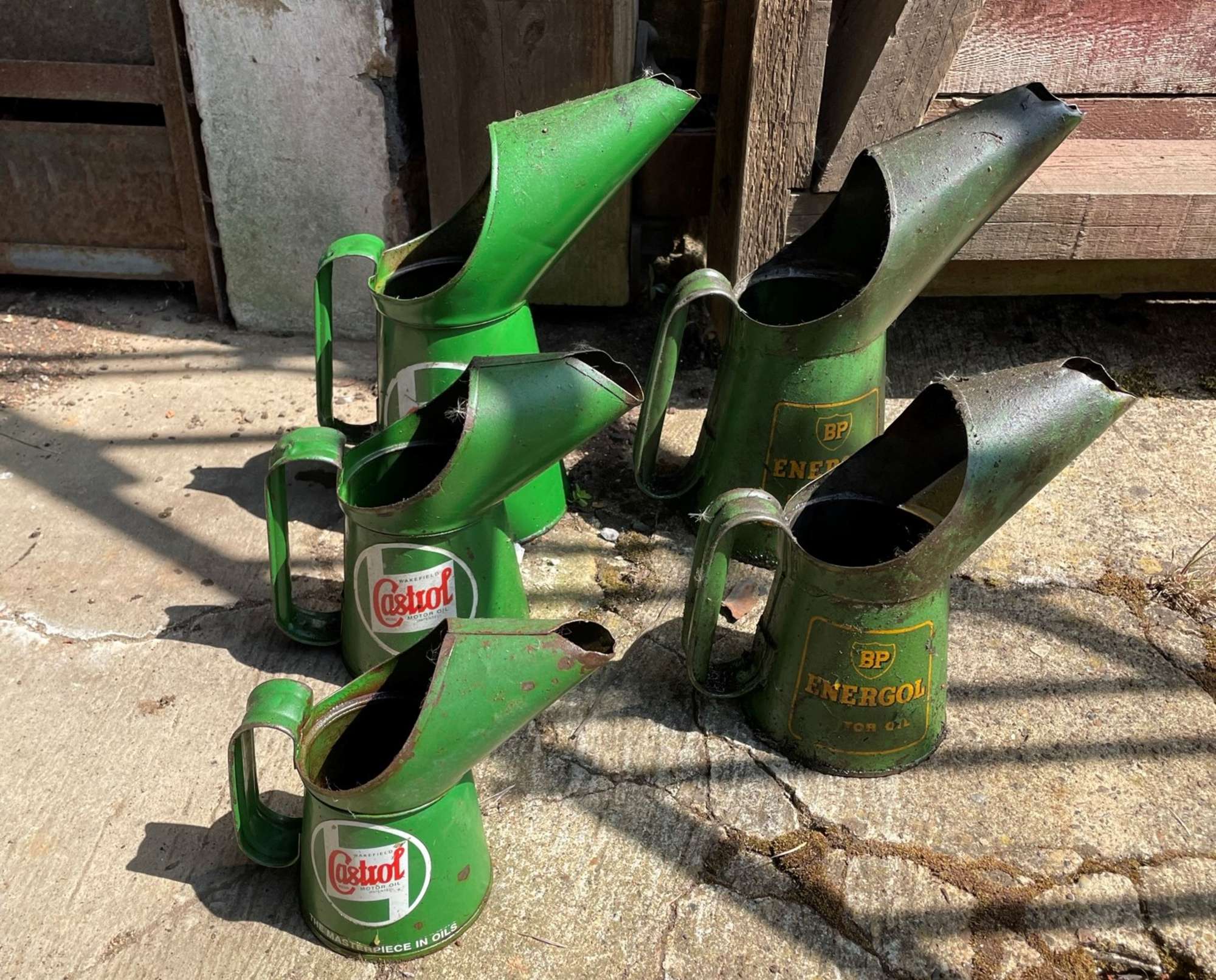 Six Assorted Oil Dispensers and Fuel Can