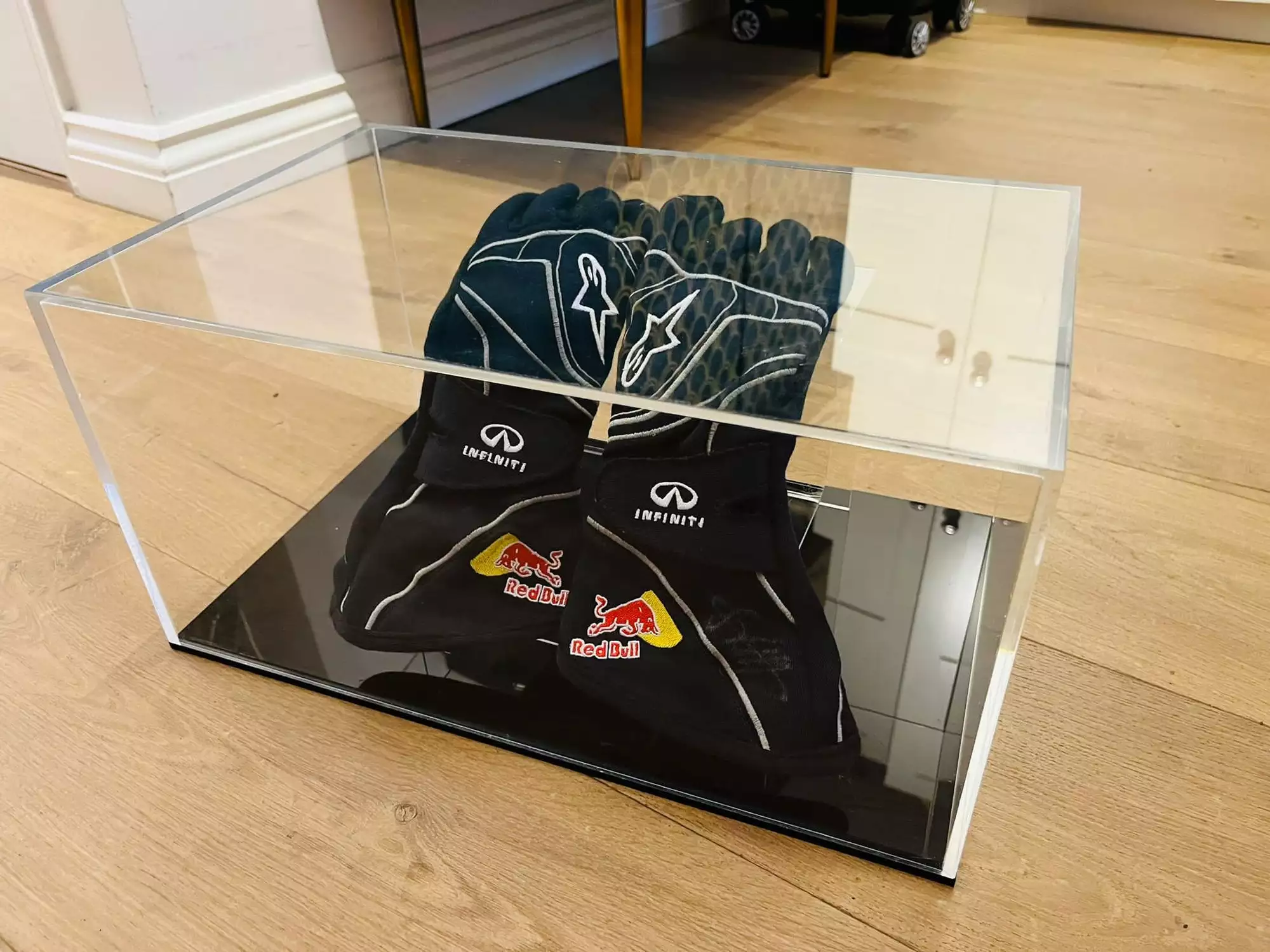 A Pair of Red Bull Gloves signed by Sebastian Vettel