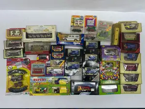 A large boxed group of assorted die-cast models and train sets
