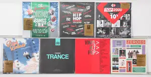 New Vinyl: A selection of contemporary compilation vinyl records spanning genres such as hip-hop, alternative pop, and trance, primarily featuring high-quality