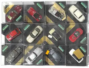Vitesse, a boxed group to include 072B Jaguar MkII 3.4 (1960) in Old English White, VCC073 Austin 1300GT (1969) in Whiter and others