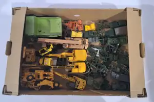Dinky, NZG and similar die-cast model vehicles, construction equipment and military vehicles, a mixed group to include examples of a NZG Dump Truck, Caterpilla