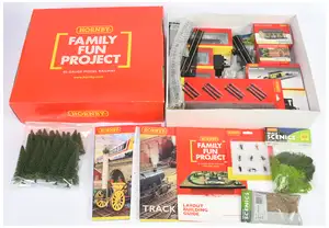 Hornby (China) OO Gauge R1265 Family Fun Project Starter Pack with a locomotive and selection of rolling stock plus other items, appears complete but unchecked