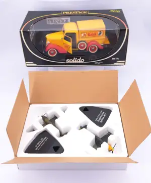 Solido and similar, a boxed group to include Ford Pickup ‘Kodak’ delivery truck and Supermarine Spitfire Mk.I and Messerschmitt Bf 109E-4 aircraft models. 