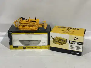 John Deere and Caterpillar, a boxed group of two 1:16 scale crawler tractor models to include, John Deere 2010 Crawler (Collector Edition, die-cast metal) and 