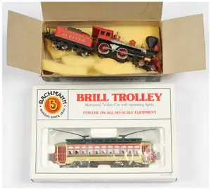 Bachmann HO Gauge 61040 Christmas Trolley car & “Jupiter” locomotive in red and black livery with festive detailing, fitted with cowcatcher and bell detail