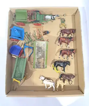 Britains and similar lead and plastic farm figures and accessories, a mixed group to include examples of horses, a farm cart with horse, and farm wagons, and o