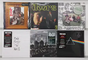 New Vinyl: A collection of classic and psychedelic rock albums featuring prominent…