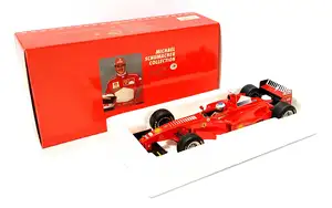 Minichamps, a boxed 1:18 Scale 510 981803 Ferrari F 300 "M. Schumacher"