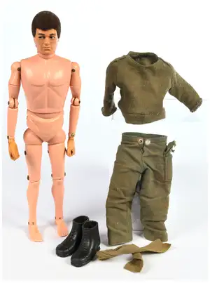 Palitoy/Hasbro Action Man vintage loose figure, flock hair, eagle eyes, left hand rubber right hand rigid, comes with shirt, trousers, boots and scarf.