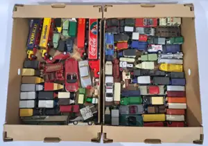 Corgi, Lledo and similar, a boxed group of mainly diecast vehicles. Including a Coca-Cola articulated lorry, a Weetabix liveried truck, and a selection of salo