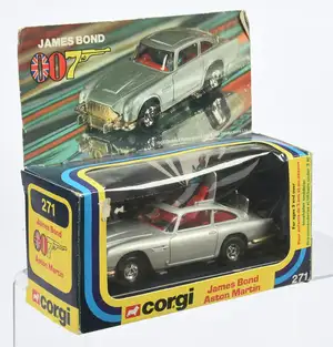 Corgi Toys 271 "James Bond" Aston Martin DB5 (1/36th) - Silver body with red interior