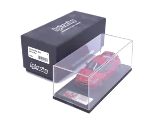 HPI Racing, a boxed Nissan GT-R (R35) in vibrant red finish with detailed interior and alloy style wheels. Not checked for completeness. Condition appears Near