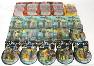 Masters of the Universe, Stargate, SeaQuest DSV, and Flash Gordon carded action figure collection, featuring 1. Mattel Masters of the Universe Mega-Punch He-Ma