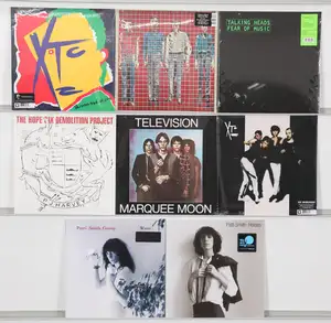 New Vinyl: A collection of post-punk, new wave, and alternative rock LP records featuring seminal artists. The selection includes influential studio albums spa