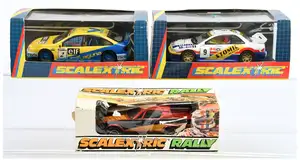 Scalextric Slot Car A Group Of 3 - (1) C113 Triumph TR7, (2) C2177 Subaru Impreza and (3) C2078 Renault Laguna