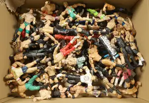 Hasbro, a Unboxed Group of WWE Wrestler Action Figures.