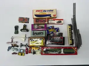 Mixed toys, die-cast models and railway items, a boxed and unboxed group