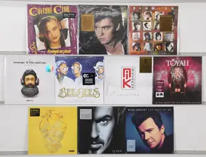 New Vinyl: A selection of pop, soul, and new wave vinyl records featuring notable artists such as George Michael, Bee Gees, and Culture Club