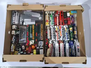 Corgi, Lledo and similar, an unboxed and boxed group of diecast commercial vehicles, buses and accessories. Including articulated lorries in various liveries s