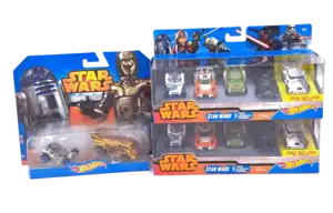 Hot Wheels, a boxed group of Star Wars themed diecast models to include R2-D2 character car, Darth Vader character car and a Star Wars 5-vehicle pack and other