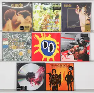 New Vinyl: A selection of Britpop, baggy, and indie rock LPs featuring seminal releases from The Stone Roses, Primal Scream, and Suede. The collection includes