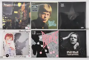 New Vinyl: A selection of classic rock and glam rock vinyl records featuring David Bowie studio albums, including Record Store Day exclusives and modern heavyw